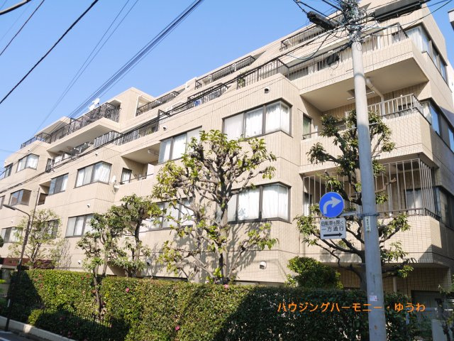 【外観】 | サンコート池袋 | モダンでスタイリッシュな印象を与えるグレーを基調とした外観。