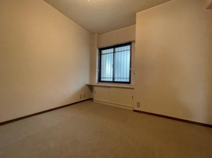 ローレル東生駒の洋室