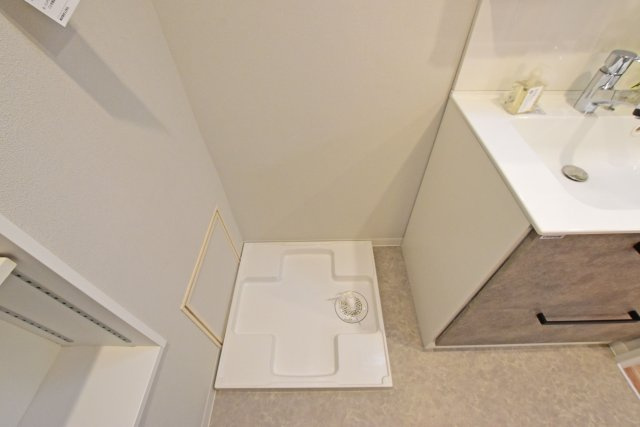 伊丹レックスマンションの洗面所|洗濯パンの内観写真です。