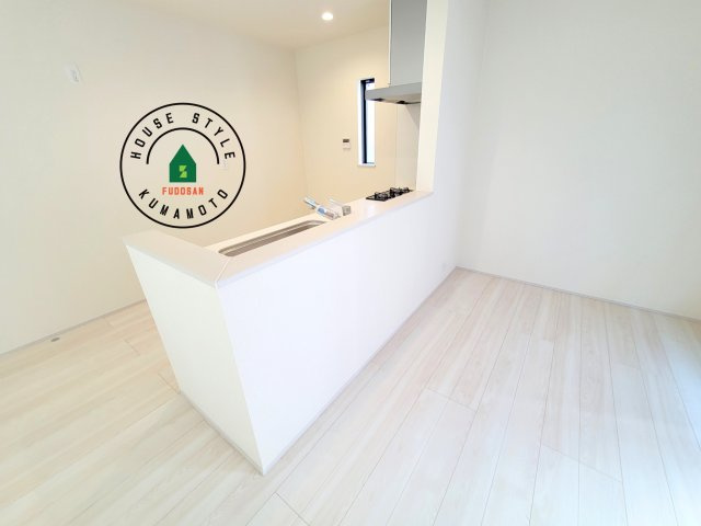 熊本市中央区壺川1丁目第1-2棟（1号棟）の内観：施工例|キッチンから立ち込める香りが今日の料理を期待させます。