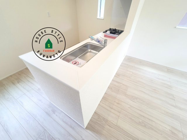 熊本市中央区壷川1丁目第1-2棟（2号棟）の内観：施工例|キッチンから立ち込める香りが今日の料理を期待させます。