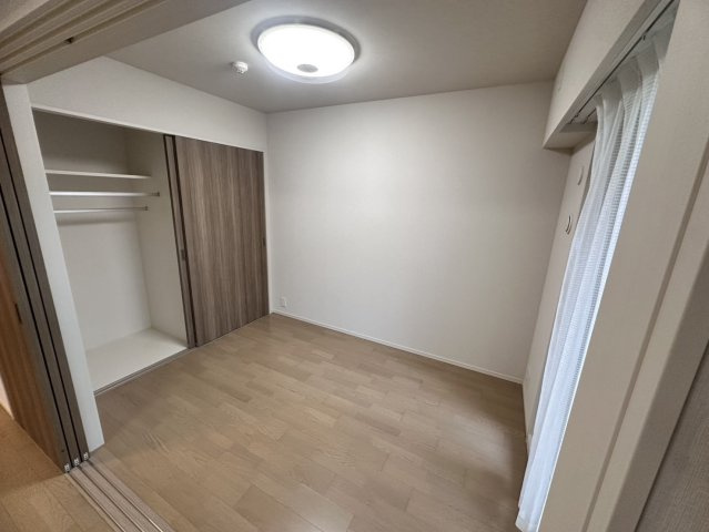 桜区田島3丁目分譲賃貸マンションの洋室