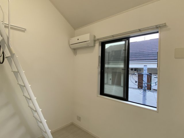 川崎市多摩区三田２丁目のアパートの寝室