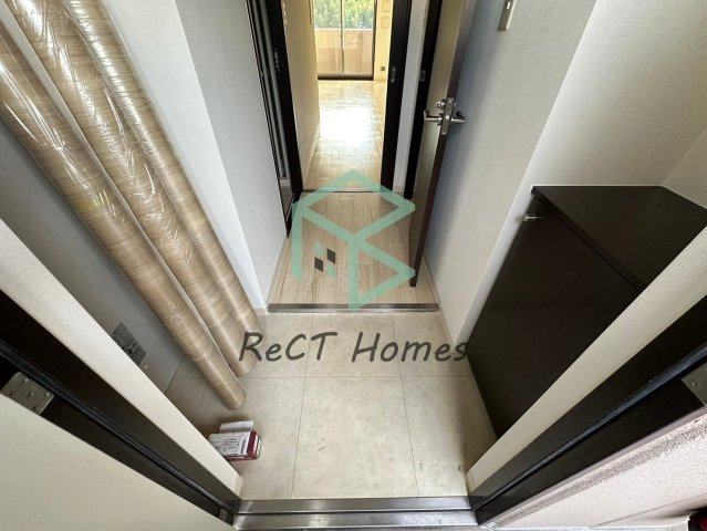 インタービレッジ高岡駅前の玄関