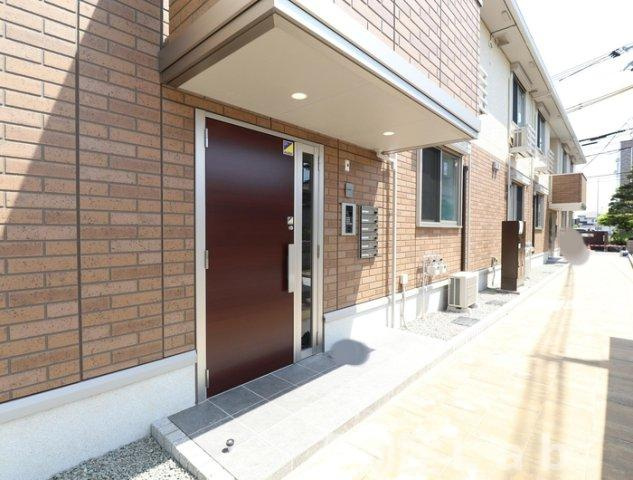 ホワイト　オゥルⅡのエントランス