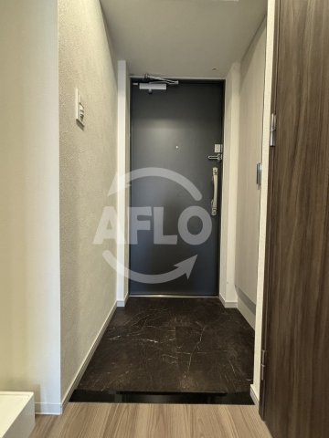 プレサンス野江内代ペルティエ　内代小学校区の玄関|プレサンス野江内代ペルティエ　玄関