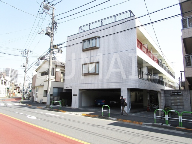 カーサ栄の外観|白タイルのきれいな建物です！