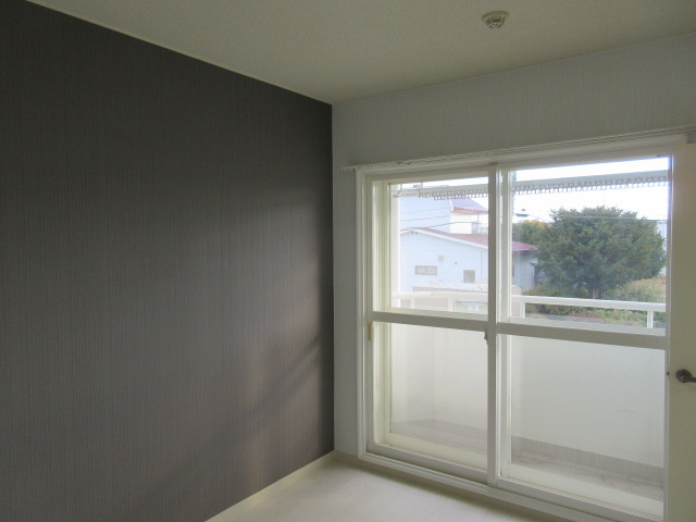 コンフォートKUSAKAの洋室