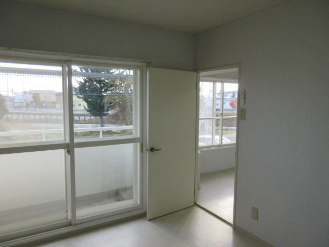 コンフォートKUSAKAの洋室