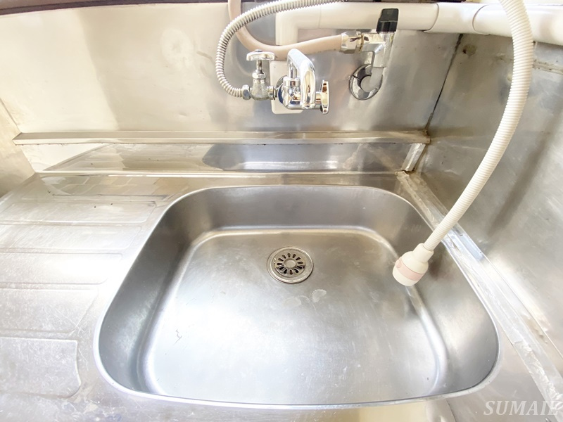 村上マンションの洗面所|バルコニーに洗濯機置き場！