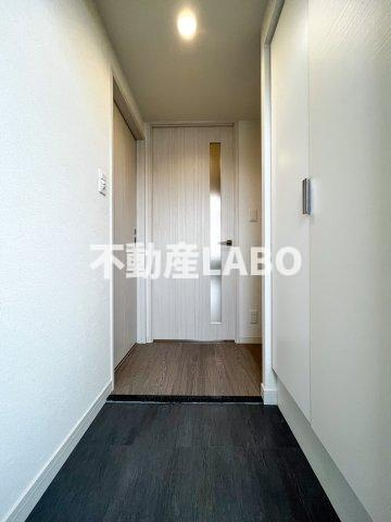 プレサンス DOMECITY コレーレの玄関