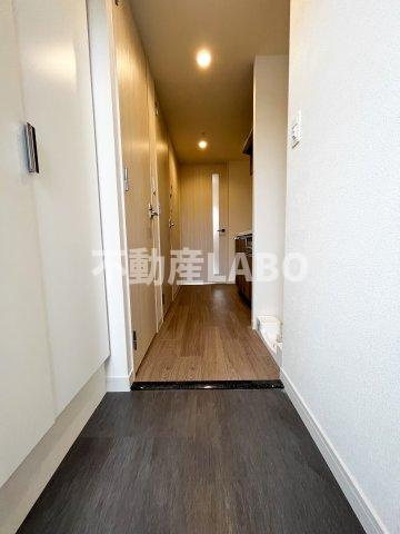 プレサンス DOMECITY コレーレの玄関