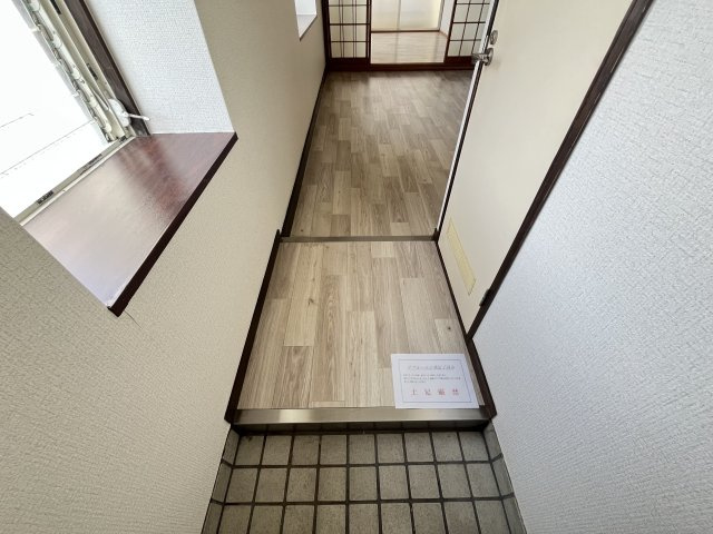 旭マンションの玄関