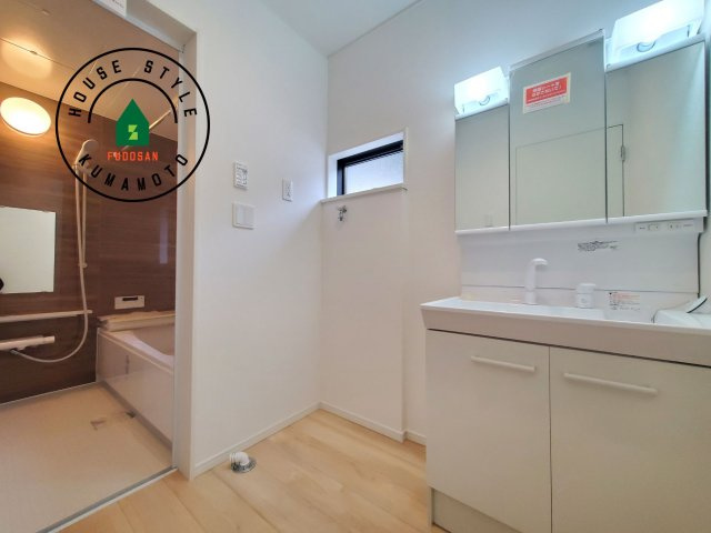 菊池郡大津町杉水第1₋2棟（2号棟）の内観：施工例|脱衣所、洗面所は小さなプライベートスペース。歯磨き、洗顔と毎日施す個人空間。