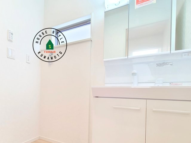 菊池郡大津町杉水第1₋2棟（2号棟）の内観：施工例|洗面所は小さなプライベートスペース。歯磨き、洗顔と毎日施す個人空間。