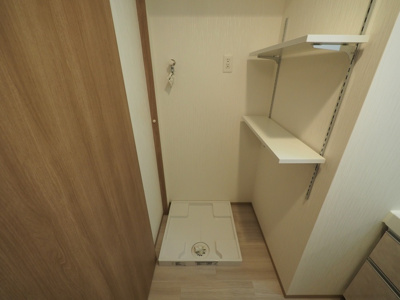 【設備】 | プレジオ西中島ASIAN | 洗濯機置き場です