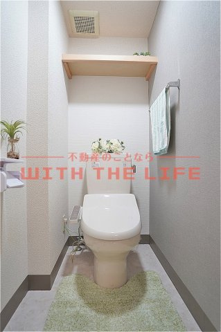 AMアオキ【キャッシュバック対象物件】のトイレ|落ち着いた色調のトイレです