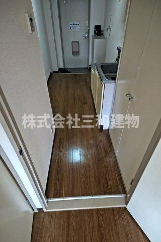 リキューハイツシオノの玄関