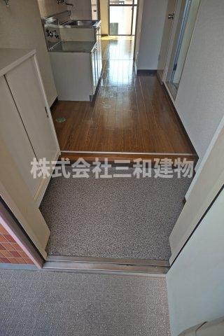 リキューハイツシオノの玄関