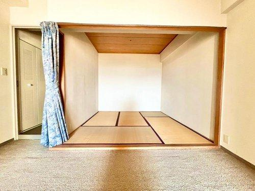 水鉄アーバンコンフォート岩出の内装|リビングダイニングから見た和室4.5帖