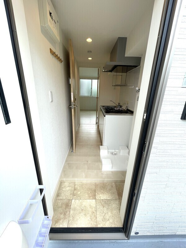 アザーレ・ターコイズよみうりランド前の玄関|別部屋の参考写真です。