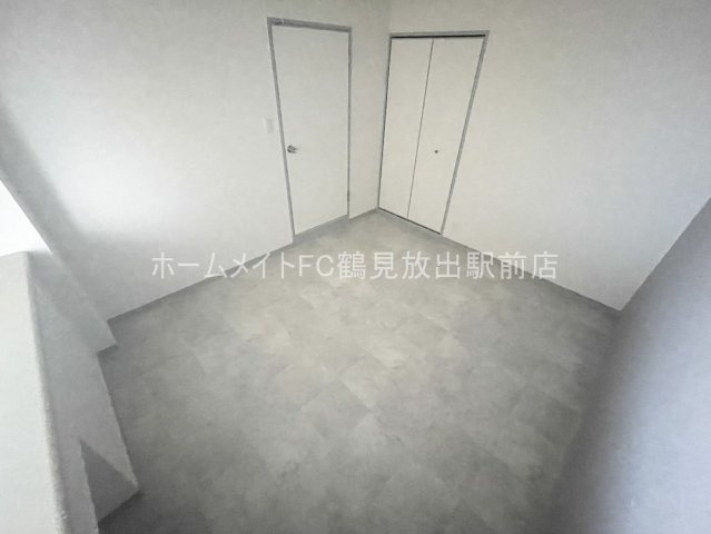 東大阪市稲田上町１丁目の賃貸マンションの洋室