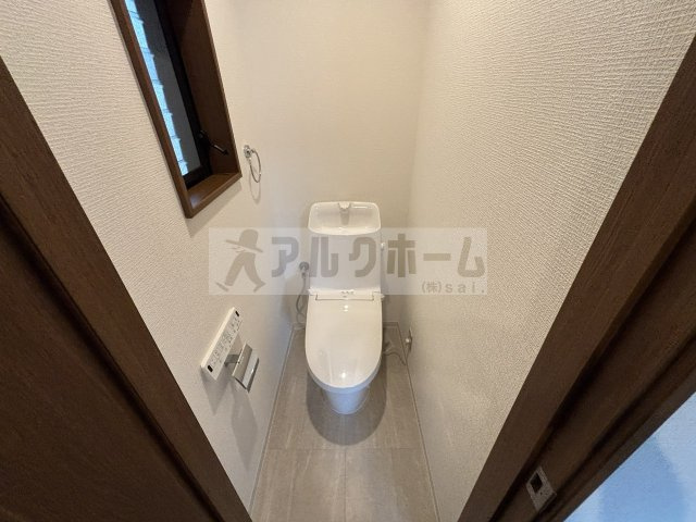MC法善寺4丁目貸家のトイレ