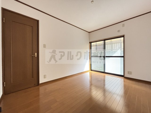 MC法善寺4丁目貸家の洋室