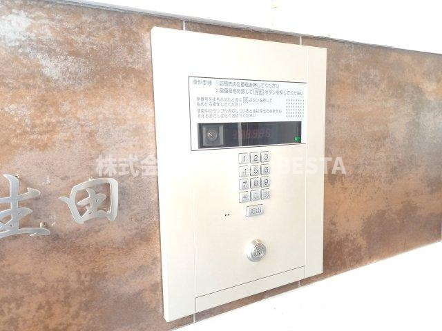 メゾンエスプリ生田のエントランス