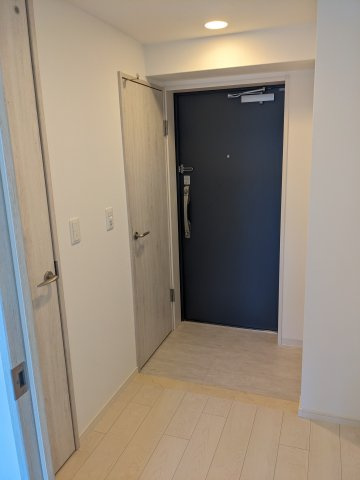 グルーブ神戸元町アリアの玄関|モデル住戸901の室内写真です