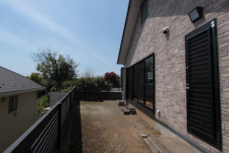 野田　大室邸の外観|キッチン脇には勝手口があります。