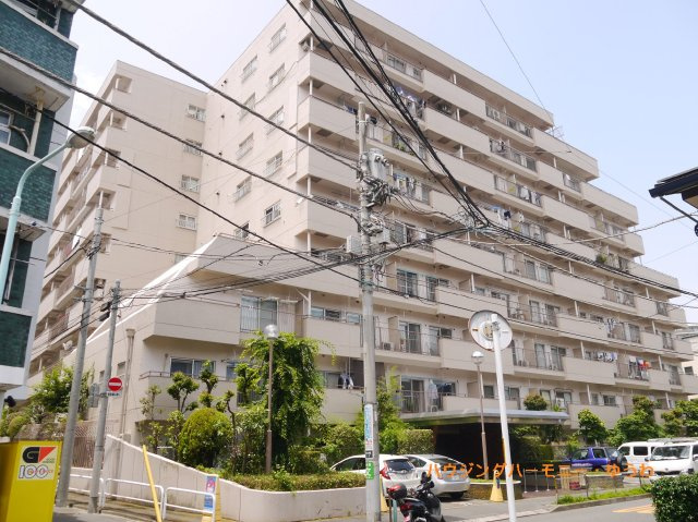 【外観】 | コープ野村大塚 | モダンでスタイリッシュな印象を与えるグレーを基調とした外観。