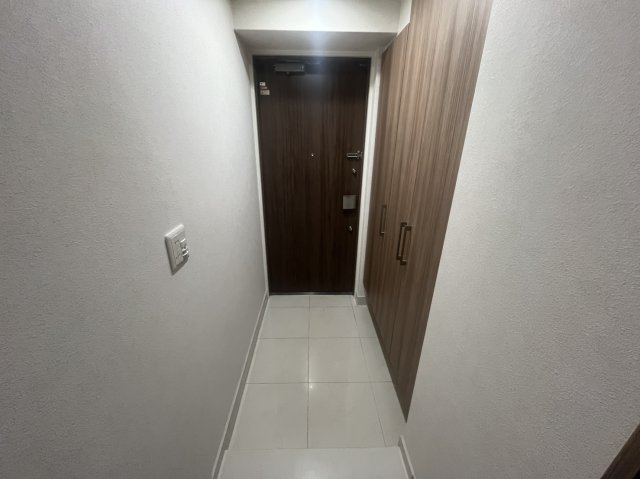 ライオンズ六甲道記田町の玄関