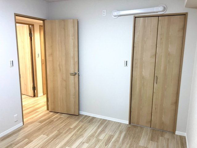 ジェイシティ中新町の洋室