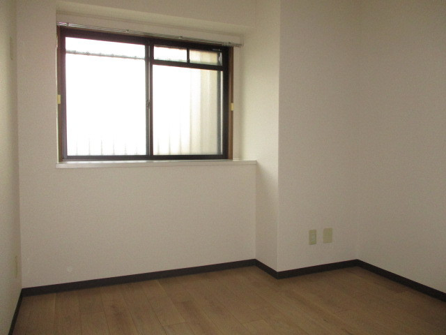 チサンマンション斑鳩1番館の寝室