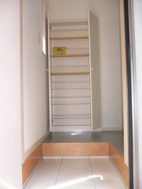 ヘブンリーブルーJの玄関