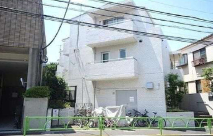 中銀弦巻マンシオン　二人入居可　常時ゴミ出し　分譲賃貸　最上階の外観