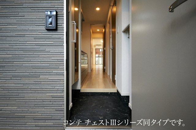 長後アパートの玄関