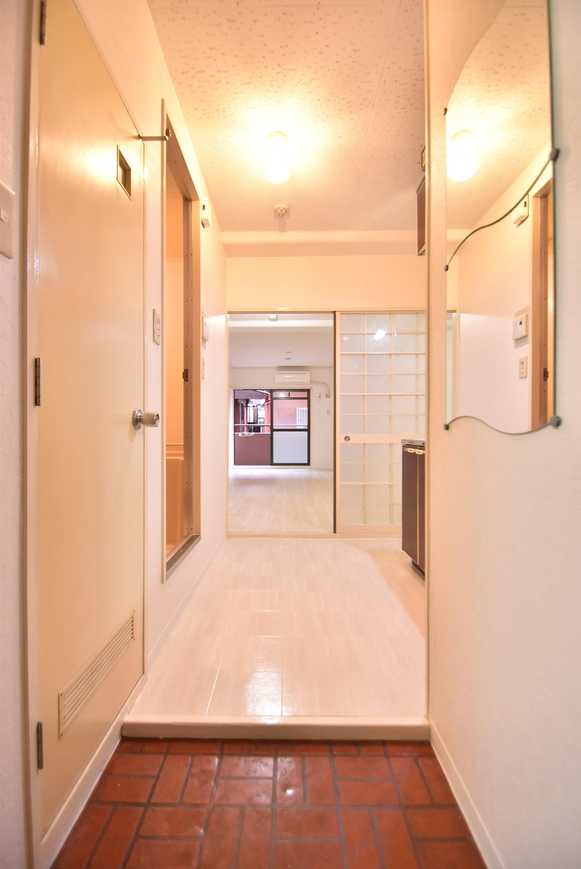 大阪市都島区都島南通１丁目の賃貸マンションの玄関