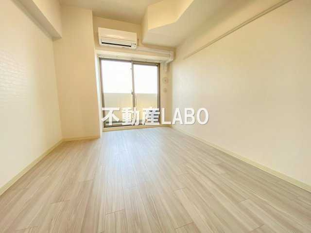 プレサンスOSAKA DOMECITY クロスティの寝室