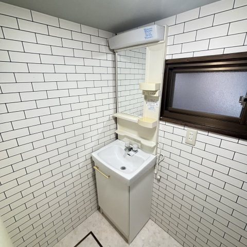 枚方市東山1丁目貸家の洗面所