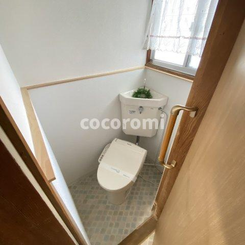 門真市上野口町貸家のトイレ