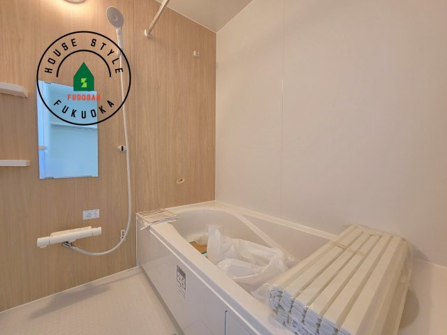 福岡市城南区西片江2丁目第1-2棟（1号棟）の内観：施工例|1日の疲れを癒してくれる広々バスルーム。雨の日のお洗濯にも大活躍な浴室乾燥機付です！