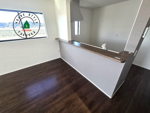 福津市津屋崎8丁目第1-3棟(2号棟）の内観：施工例|キッチンから立ち込める香りが今日の料理を期待させます。