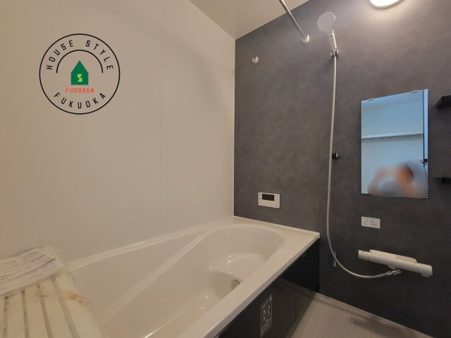 糸島市前原中央3丁目第1-3棟（2号棟）の内観：施工例|1日の疲れを癒してくれる広々バスルーム。雨の日のお洗濯にも大活躍な浴室乾燥機付です！