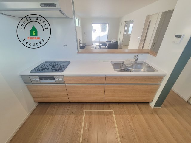 古賀市薦野第1-3棟（1号棟）のキッチン|ご家族を近くに感じられる対面キッチンのLDK。会話もはずみそうですね。