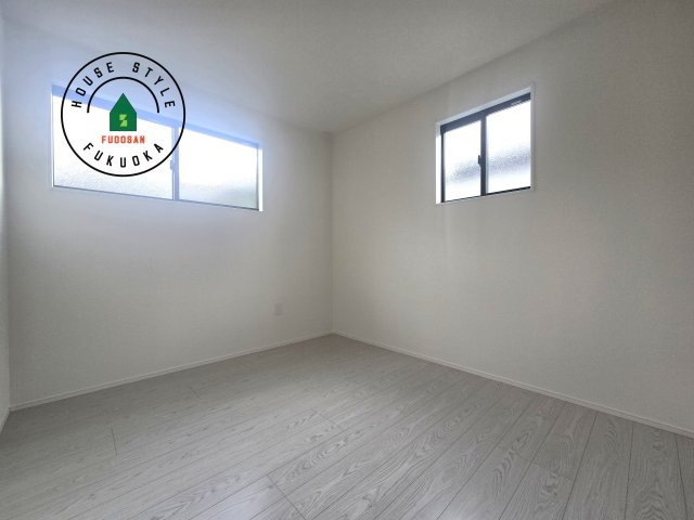 福津市福間南5丁目第6-2棟（1号棟）の内観：施工例|落ち着いた色調の洋室です。