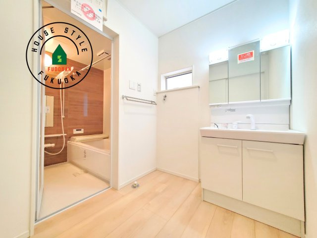 春日市紅葉ケ丘西2丁目第7-2棟（2号棟）の内観：施工例|脱衣所、洗面所は小さなプライベートスペース。歯磨き、洗顔と毎日施す個人空間。