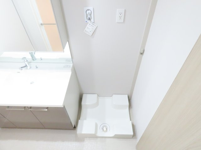 ザ・プレミアム長崎駅前の洗面所|室内洗濯機置き場