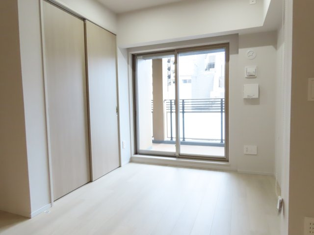 ザ・プレミアム長崎駅前の居間・リビング|3帖の洋室